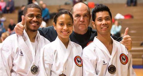 Sensei Greg Reid with Jeremy Sullivan, Tameka Cox and Nomerlito Cortez.