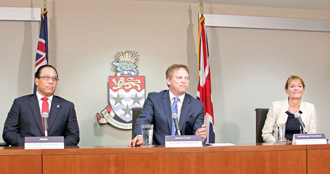 In August, Acting Overseas Territories Minister Grant Shapps, center, who had temporarily replaced Minister James Duddridge, was in Cayman to discuss beneficial ownership information.