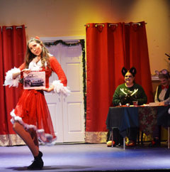 Hannah Howe, left, performs ‘Santa Baby’ while Santa, Grizz and Frizz look on. (Playhouse Family Christmas, 2014)