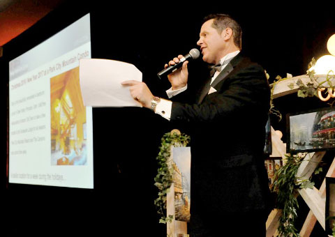 Kim Remizowski served as the auctioneer in the live auction that netted more than $200,000. – Photo: Alan Markoff