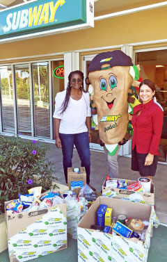Beulah McField of Meals on Wheels, left, and Stacey VanDevelde of Feed our Future.