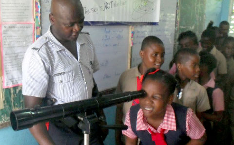 Students in Jamaica try out a Galileoscope.
