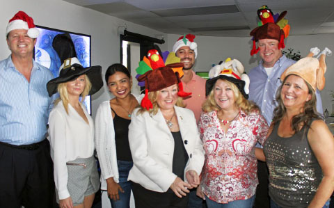 Some of the owners, employees and friends of the company. - Photo: Alan Markoff