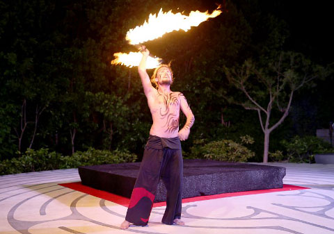 Dancing with fire: David Blumenthal displays his skills with fire at the labyrinth at the National Gallery.