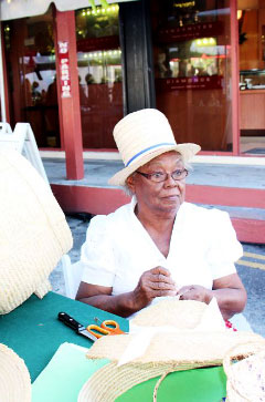 Marlena Anglin crafts hats and handbags from the leaves of silver thatch palms. – PHOTOS: JAMES WHITTAKER