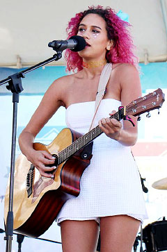 Acoustic singer-songwriter Maeve impressed the crowds with her repertoire of covers and original songs.