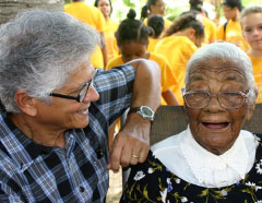 Cayman National Cultural Foundation director Henry Muttoo with Aunt Julia at her 105th birthday celebrations in January 2014. - PHOTO: JEWEL LEVY