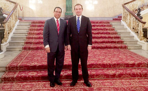 Cayman Islands Premier Alden McLaughlin, left, and Overseas Territories Minister James Duddridge at the opening of the Joint Ministerial Council meeting in London on Tuesday.