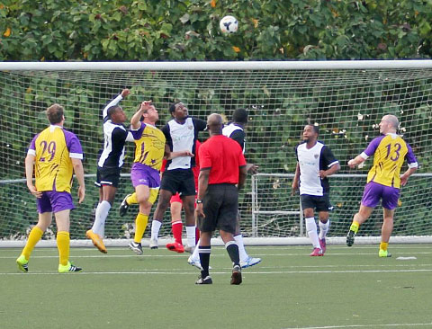 OtisAir Wanderers defend a Whiskey Mist corner. - PHOTOS: RON SHILLINGFORD