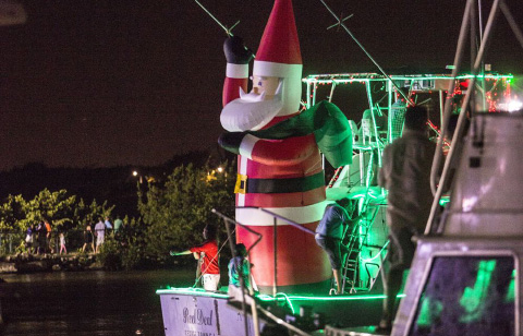 A giant Santa keeps an eye on the boats. - PHOTO: STEPHEN CLARKE