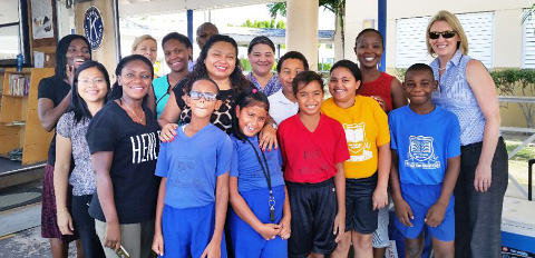 The Kiwanis on a visit with their Book Mobile to George Town Primary School.