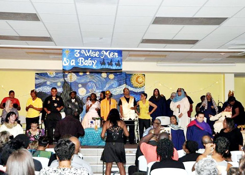The cast performs a big number.