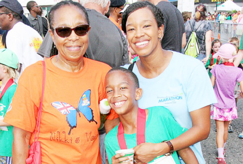 Kids Run participant Ethan Bodden with his mother Tiffany Ebanks and grandmother Marlene Moore.
