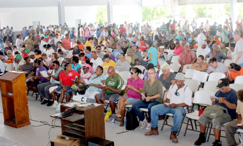 Caymanians seeking seasonal work with government fill out applications at the Lions Centre Monday. -Photo: Jewel Levy