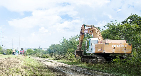 Work on widening the southern portion of the Esterley Tibbetts Highway to four lanes started Monday. - Photo: Taneos Ramsay