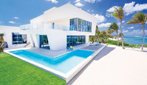 The contemporary design of the Rum Point house, owned by the Brewers, stood out for the judges. - PHOTO COURTESY OF REALLIFE MAGAZINE