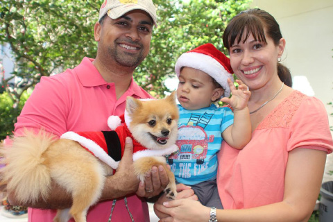 Baby Aidan with pet Monty and parents Ismail and Aline Shaboodien.