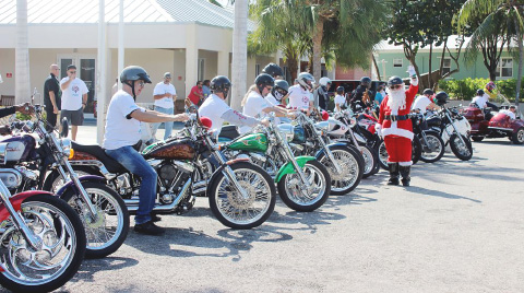 Bikers gathered at the Cayman Turtle Farm in West Bay for the Cayman Islands Motorcycle Riders Association’s annual “Toys 4 Tots” charity drive and ride campaign. – Photo: Jewel Levy