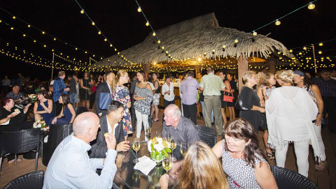 Guests enjoy the expansive outdoor entertaining space.