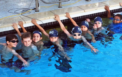 The Camana Bay Aquatic 10-under boys get ready to race.