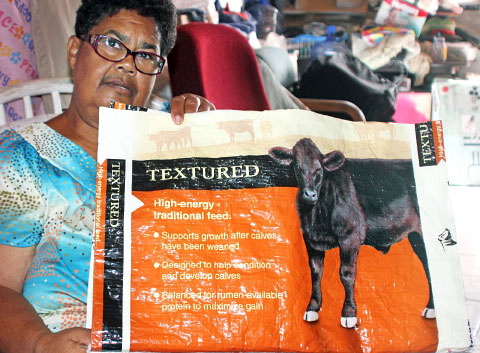 Feed bags are recycled and used as shopping bags. - Photos: Jewel Levy