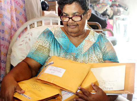 With 415 pen pals in her collection, Mrs. Dixon already has 360 Christmas letters sealed and ready to go.
