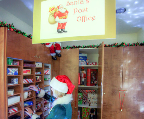 HSM’s Donna Farrow in Santa’s Post Office at HSM.