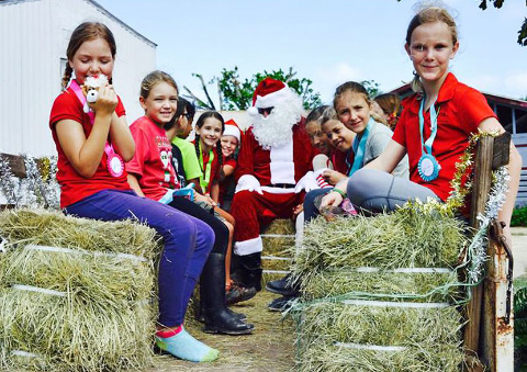 Santa impressed all with his singing skills on the hay ride.
