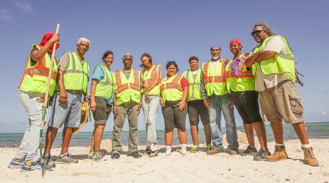 Cadion Ebanks’s crew was busy cleaning up Barkers National Park last Friday. Mr. Ebanks said hopes the seasonal program leads to full-time employment for Caymanians. - PHOTO: MATT LAMERS