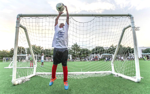 Matthias McLean, a 10-year-old at Sir John A. Cumber Primary School, gets some practice in at the Arie Smith Football Camp. - PHOTO: MATT LAMERS