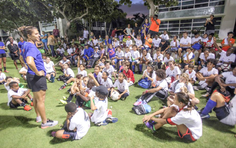 World Cup MVP and 2015 World Champion footballer Carli Lloyd fields questions at the Arie Smith Football Camp. - PHOTO: MATT LAMERS