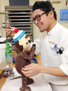 Michael Toa works on his elf, 