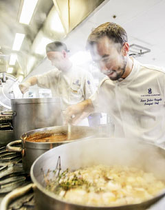 Chef Lucas Julien-Vauzelle hard at work in The Ritz-Carlton kitchen. – PHOTO: MATT LAMERS