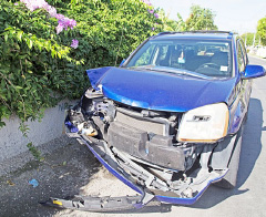 The damaged Chevrolet Equinox remained outside the house on July Street on Monday. – Photos: Kelsey Jukam