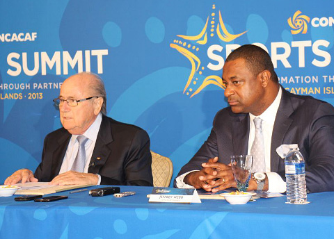 Jeffrey Webb, right, with FIFA President Sepp Blatter at a press conference in the Cayman Islands in 2013.