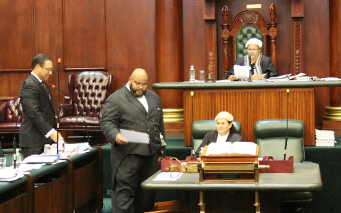In this photo from October 2015, Legislative Assembly Serjeant-at-Arms J. Kim Evans tables the order authorizing acceptance of the 2015 Electoral Boundary Commission’s recommended changes