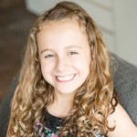 Young singer on 80-country anthem challenge visits Cayman
