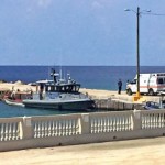 Bodies found on boat remain at morgue