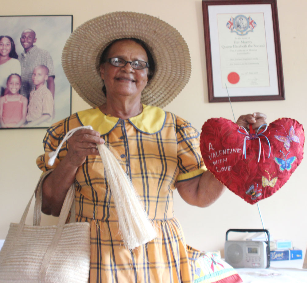 Crafter Carmen Conolly displays works to be entered in the show.