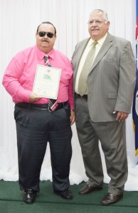 Erbin Tibbetts with Minister of Agriculture Kurt Tibbetts