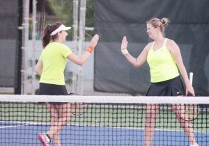 Doubles partners Irena Blocher and Jade Wilkinson celebrate a point.