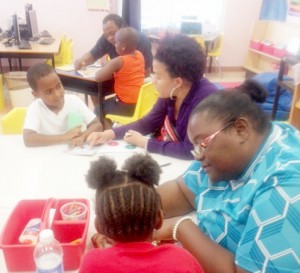Parents and students take part in reading activities.