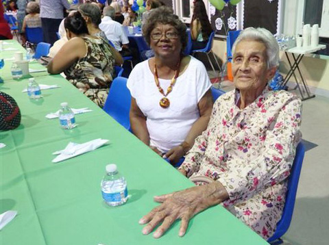 Marlena Anglin with oldest female winner, Hulda Ebanks.