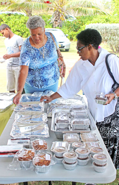 Partygoers enjoy the cassava and yam heavy cakes.