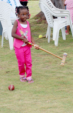 Reaganne Forrester plays croquet.