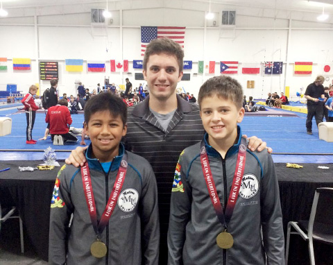From left, Karthik Adapa, Coach John Leonard and Igor Magalhaes.