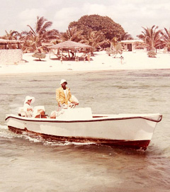 This photo, taken sometime in the 1970s, shows Darby Bodden transporting a tourist at the Tortuga Club.