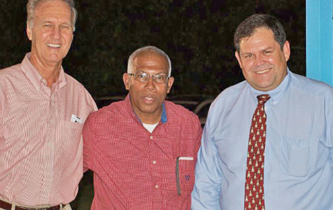 Pastor Randy Von Kanel, left, Dan Ebanks, center, and Minister Wayne Panton