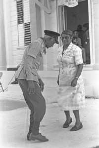 National Hero Sybil McLaughlin dances with an East End elder in front of the town hall in the 1980s.