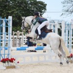 Cayman Riding School athletes earn jump series ribbons